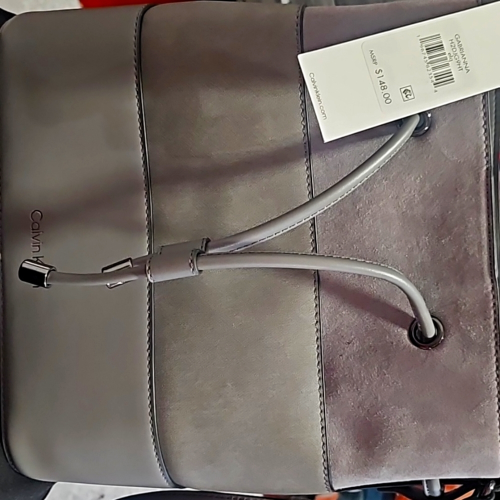 Brand new Calvin Klein gray crossbody bag with tags